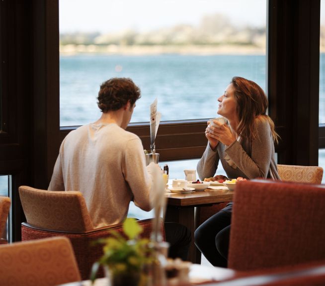 Couple having breakfast at St. Martins Lodge Restaurant